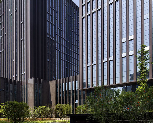 沈陽幕墻安裝維修公司淺析如何有效地解決玻璃幕墻自爆的問題